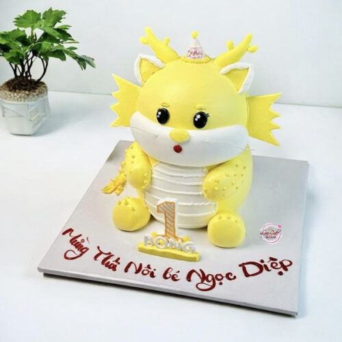 Bánh thôi nôi con rồng 1 tuổi màu vàng đáng yêu cho bé gái và bé trai
